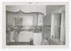 A woman washing dishes