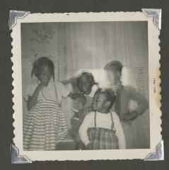 Four young girls standing together