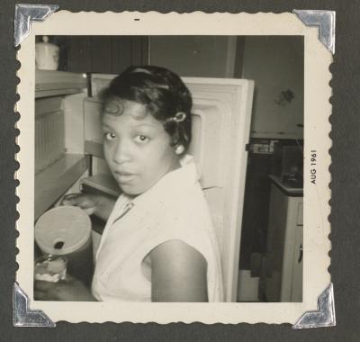 A woman pouring iced tea