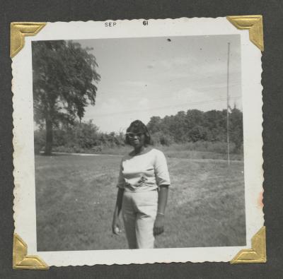A woman in a white shirt and pants 