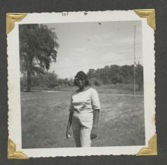 A woman in a white shirt and pants 