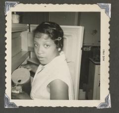 A woman pouring iced tea