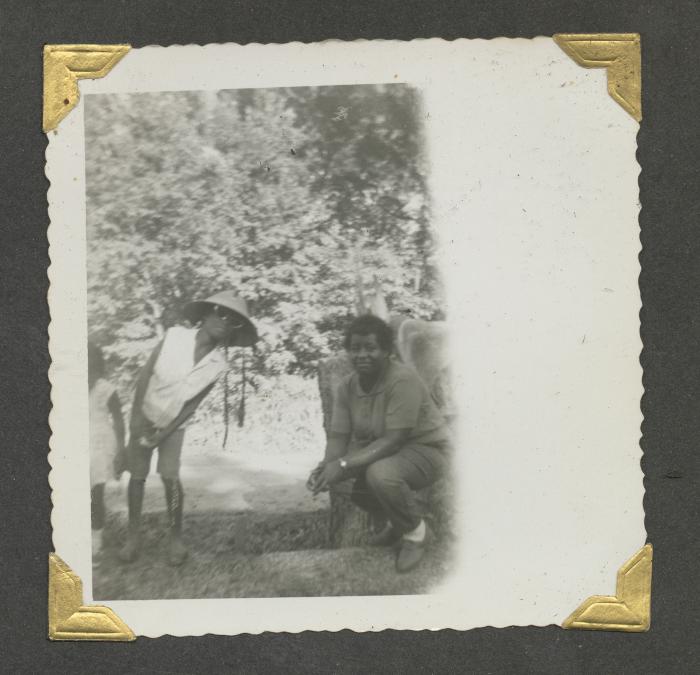 Two women leaning in for a picture