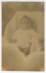 A baby in a white bundle