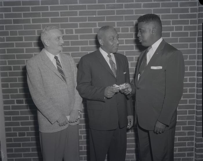 Elmer Hawkins, Hilton, and Henry Demain at Garnet High School