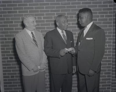 Elmer Hawkins, Hilton, and Henry Demain at Garnet High School