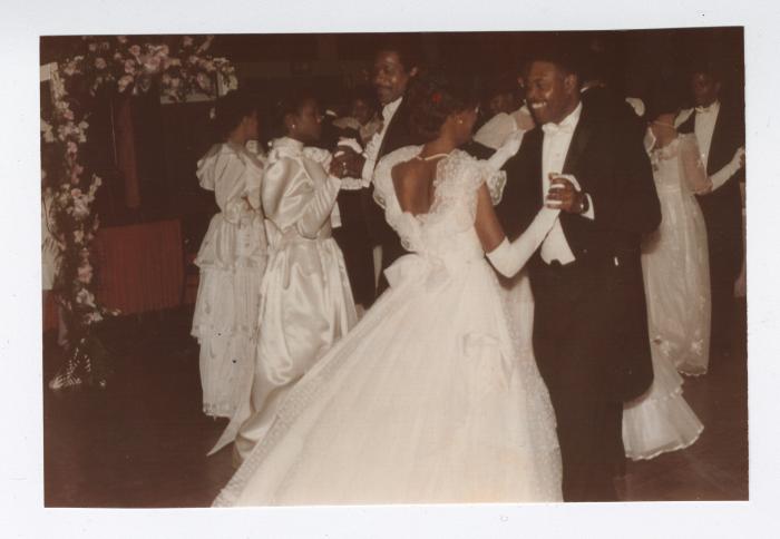 Monique Saunders dancing with her father James Saunders