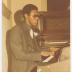 Postcard with a pianist
