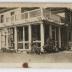 A large building with a screened-in porch