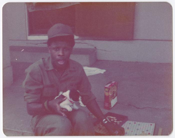 Soldier with a puppy and scrabble