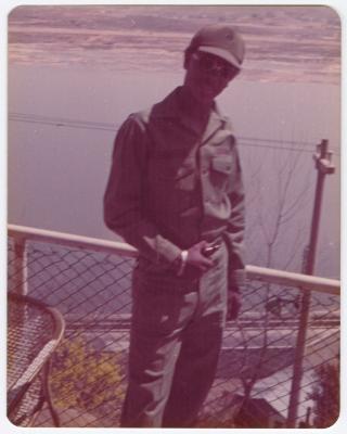 Soldier standing on a balcony
