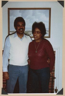 Man and woman by fireplace