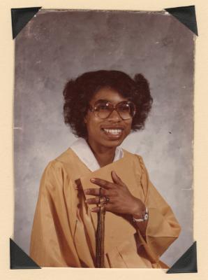 Young girl in graduation robes