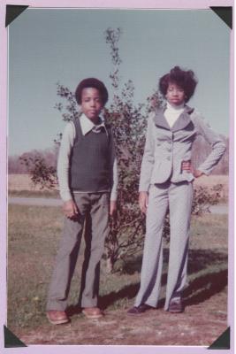 Boy and girl standing outside