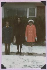Three teenagers outside
