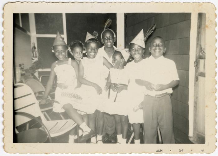 Children posing at a birthday party