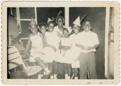 Children posing at a birthday party