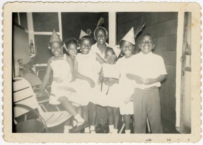 Children posing at a birthday party