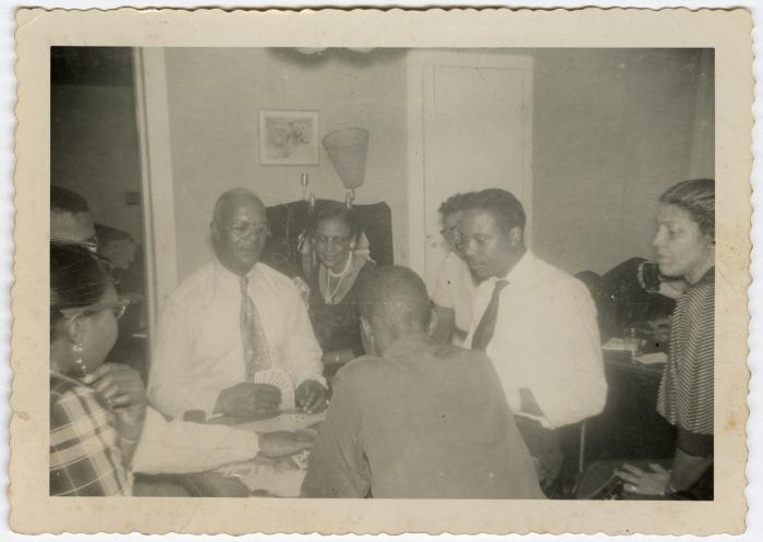 Men playing a card game