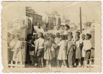 Students getting on a bus