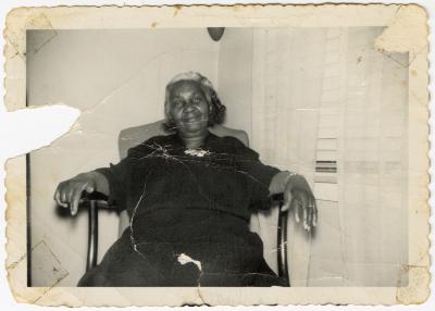 Rebecca Frisby sitting in a chair