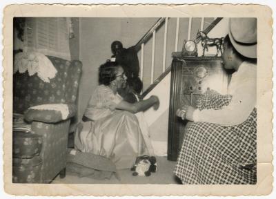 Women gathered by the radio 