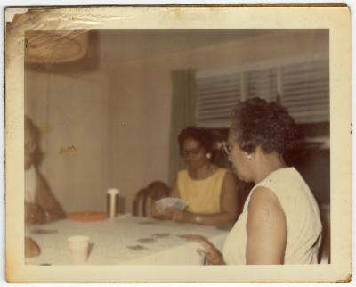 Ladies playing a card game
