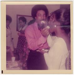 Terry Edgerton and her husband feeding each other cake