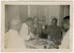 Men playing a card game