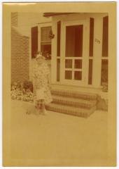 Women and child standing outside