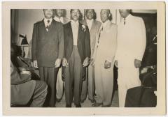 James Manuel posing with wedding guests