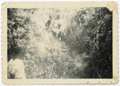 Four girls playing on a hillside