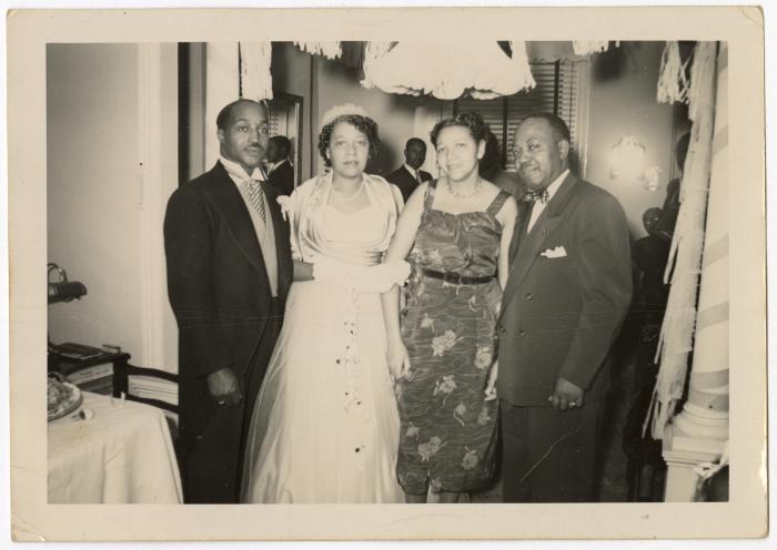 James and Gertrude Manuel with weddings guests
