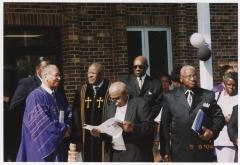 Church members outside the church