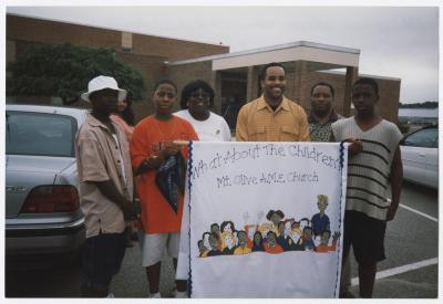 "What About The Children?" banner