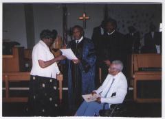Clergyman with parishioners