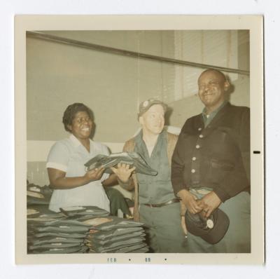 Handing out VITA Foods uniforms