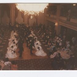 Debutantes curtseying to their escorts