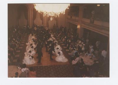Debutantes curtseying to their escorts