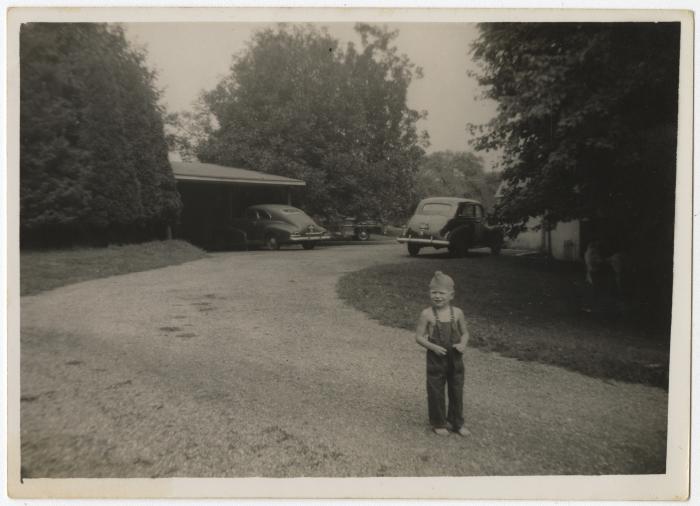 Boy in overalls