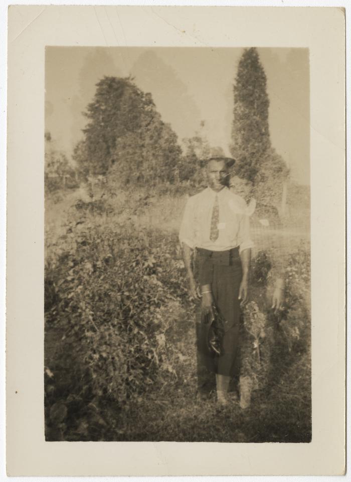 Man with bushes