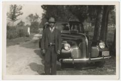 Man standing with car