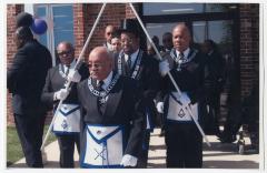 Sam Ringgold, Jimmy Sampson, William DeShields Sr., and Reginald Thomas performing a Mason ceremony