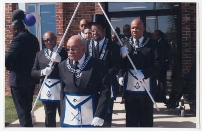Sam Ringgold, Jimmy Sampson, William DeShields Sr., and Reginald Thomas performing a Mason ceremony