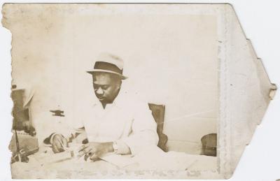 Charlie Graves in office of Uptown Club, circa 1954