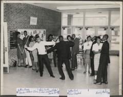Group of teenagers in a school hallway