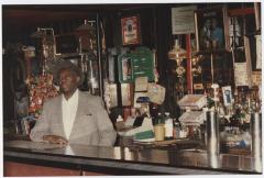 Charlie Graves behind bar at Uptown Club, prior to demolition day 1988