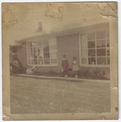 Monica and Karen, Daughters of Charlie and Hilda Graves, Outside Their New Home, circa 1965