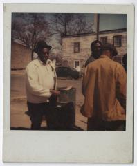 Charlie Graves outside his Uptown Club with "regulars" James Jackson and Morris Goldsborough, circa 1988