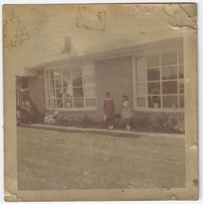 Monica and Karen, Daughters of Charlie and Hilda Graves, Outside Their New Home, circa 1965